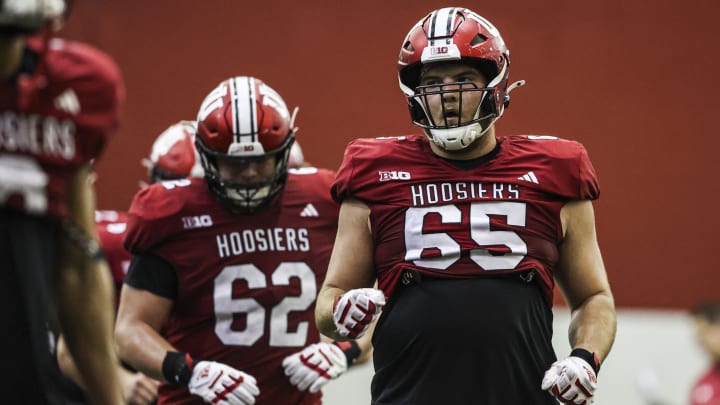 Indiana offensive linemen Carter Smith (65) and Drew Evans (62) pictured during spring practice.