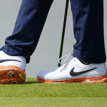 Rory McIlroy wears the Nike Victory Tour Electric 3.