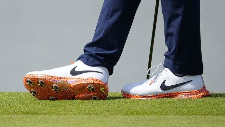 Rory McIlroy wears the Nike Victory Tour Electric 3.