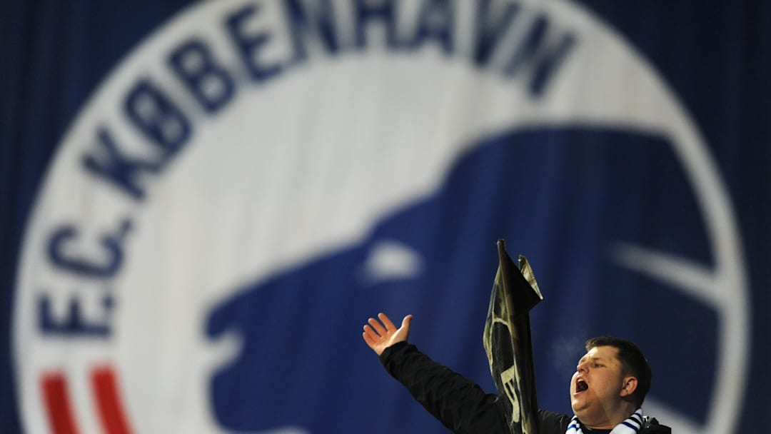 A FC Copenhagen fan cheers his team against Chelsea