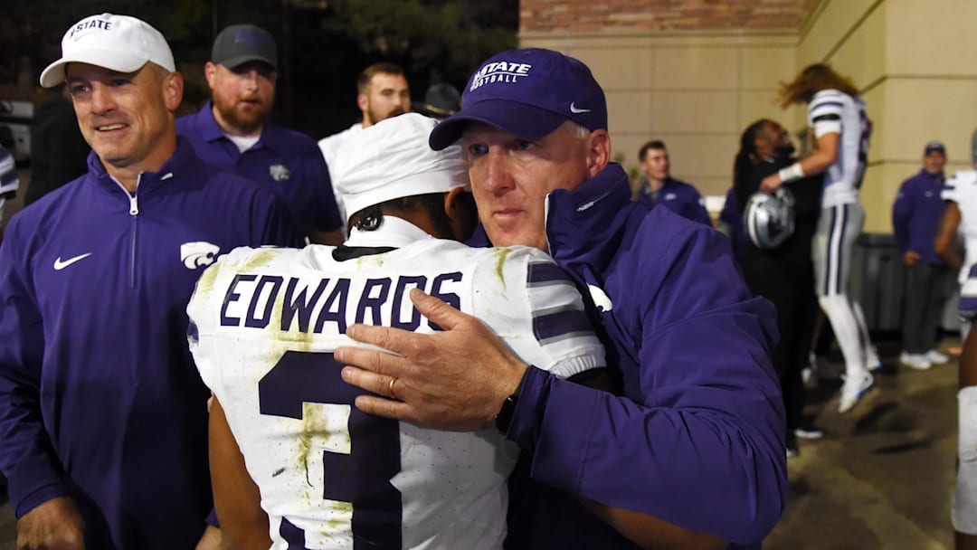 Oct 12, 2024; Boulder, Colorado, USA; Kansas State Wildcats running back Dylan Edwards (3) celebrates with Kansas State Wildcats head coach Chris Klieman after a win against the Colorado Buffaloes at Folsom Field. Mandatory Credit: Christopher Hanewinckel-Imagn Images