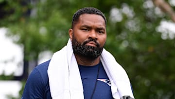 Jul 24, 2024; Foxborough, MA, USA;  New England Patriots head coach Jerod Mayo walks to the podium for a press conference before training camp at Gillette Stadium. Mandatory Credit: Eric Canha-USA TODAY Sports