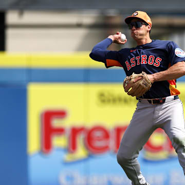 Mar 10, 2025; Dunedin, Florida, USA; Houston Astros infielder Brice Matthews (86) throws to first base against the Toronto Blue Jays in the fifth inning during spring training at TD Ballpark. 
