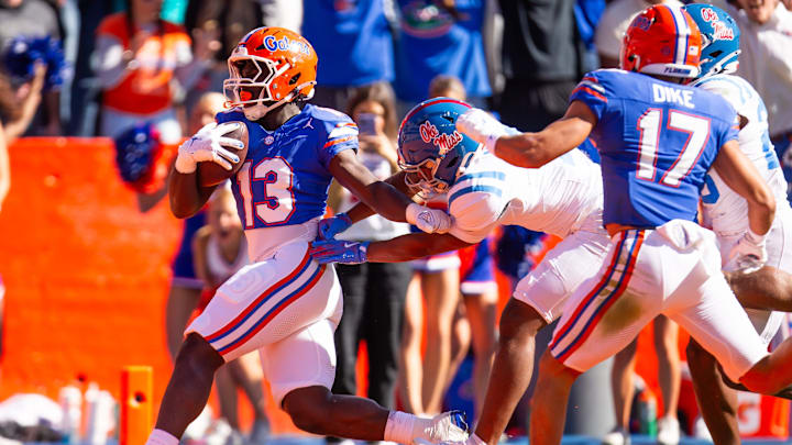 Florida Gators running back Jadan Baugh (13) runs for a first half touchdown during the first half at Ben Hill Griffin Stadium in Gainesville, FL on Saturday, November 23, 2024. [Doug Engle/Gainesville Sun]