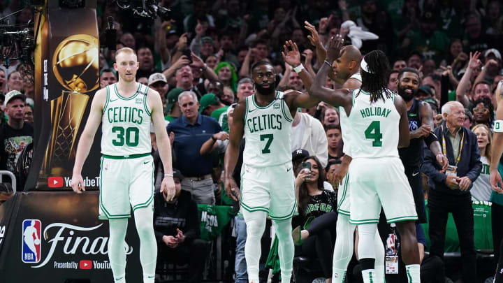 Jun 6, 2024; Boston, Massachusetts, USA; Boston Celtics guard Jaylen Brown (7) and center Al Horford (42) and guard Jrue Holiday (4) 