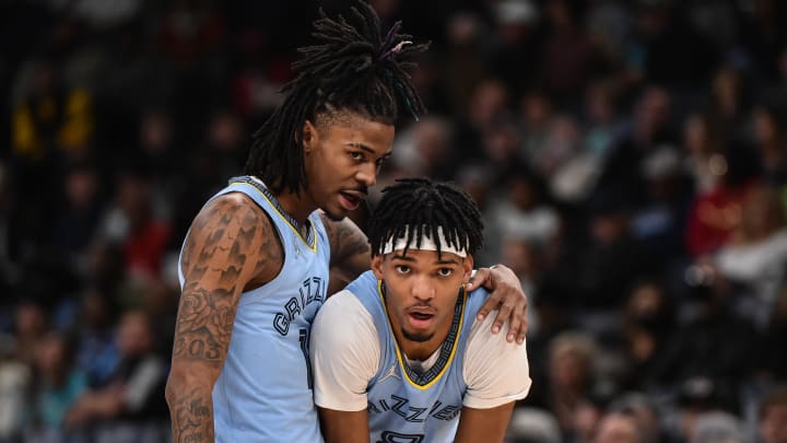 Nov 12, 2021; Memphis, Tennessee, USA; Memphis Grizzlies guard Ja Morant (12) and Memphis Grizzlies guard Ziaire Williams (8) during the second half against the Phoenix Suns at FedExForum. Mandatory Credit: Justin Ford-USA TODAY Sports