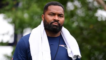 Jul 24, 2024; Foxborough, MA, USA;  New England Patriots head coach Jerod Mayo walks to the podium for a press conference before training camp at Gillette Stadium. Mandatory Credit: Eric Canha-USA TODAY Sports