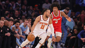 Jan 27, 2025; New York, New York, USA; New York Knicks guard Jalen Brunson (11) is guarded by Memphis Grizzlies forward Jaylen Wells (0) during the first half at Madison Square Garden. Mandatory Credit: Vincent Carchietta-Imagn Images