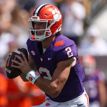 Clemson Tigers quarterback Cade Klubnik (2) scrambles against the Georgia Tech Yellow Jackets in the second quarter at Bobby Dodd Stadium at Hyundai Field. Credit: Brett Davis-Imagn Images