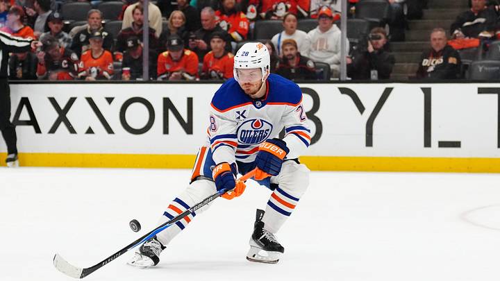 Apr 30, 2026; Anaheim, California, USA; Edmonton Oilers center Jack Roslovic (28) handles the puck against the Anaheim Ducks in the first period of game six of the first round of the 2026 Stanley Cup Playoffs at Honda Center. Mandatory Credit: Kirby Lee-Imagn Images