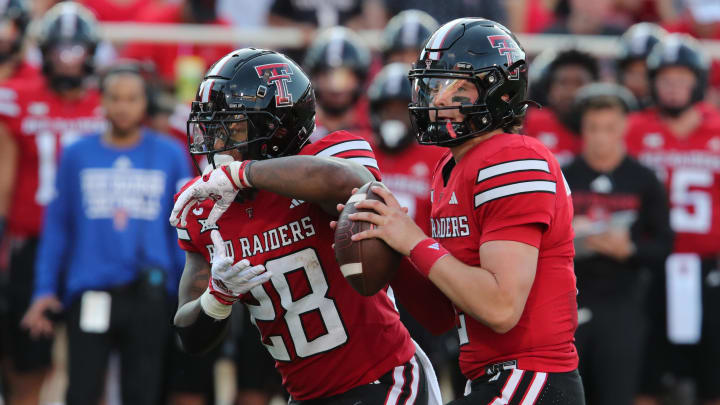 Aug 31, 2024; Lubbock, Texas, USA;  Texas Tech Red Raiders quarterback Behren Morton (2) passes against the Abilene Christian Wildcats in the first half at Jones AT&T Stadium and Cody Campbell Field. Mandatory Credit: Michael C. Johnson-USA TODAY Sports