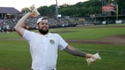 Chuck Filiaga throws bags of popcorn into the stands during the Donald Driver Charity Softball Game on Sunday, June 4, 2023, at Neuroscience Group Field at Fox Cities Stadium in Appleton ,Wis. Lori Fahrenholz for USA Today Network-Wisconsin