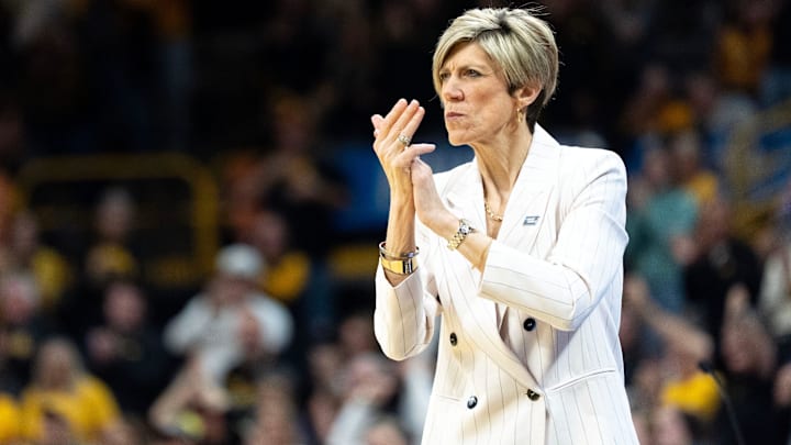 Iowa head coach Jan Jensen coaches her team against the Virginia Cavaliers March 23, 2026 during a Round of 32 NCAA March Madness game at Carver-Hawkeye Arena in Iowa City, Iowa.