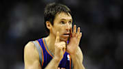 April 6, 2012; Denver, CO, USA; Phoenix Suns point guard Steve Nash (13) calls out a play during the fourth quarter of the game against the Denver Nuggets at the Pepsi Center. The Nuggets defeated the Suns 105-99. Mandatory Credit: Ron Chenoy-Imagn Images