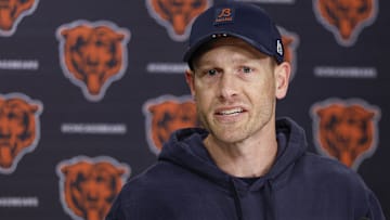 Chicago Bears head coach Ben Johnson (R) speaks during the Rookie Minicamp at Halas Hall.