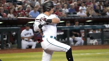Arizona Diamondbacks' Josh Rojas (10) hits an RBI single against the Atlanta Braves  on June 4, 2023, at Chase Field in Phoenix.