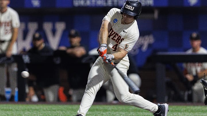 Jun 9, 2024; Lexington, KY, USA; Oregon State Beavers infielder Dallas Macias (4) hits a pitch during the fourth inning against the Kentucky Wildcats at Kentucky Proud Park. Mandatory Credit: Jordan Prather-Imagn Images Jun 9, 2024; Lexington, KY, USA; Oregon State Beavers infielder Dallas Macias (4) hits a pitch during the fourth inning against the Kentucky Wildcats at Kentucky Proud Park. Mandatory Credit: Jordan Prather-Imagn Images