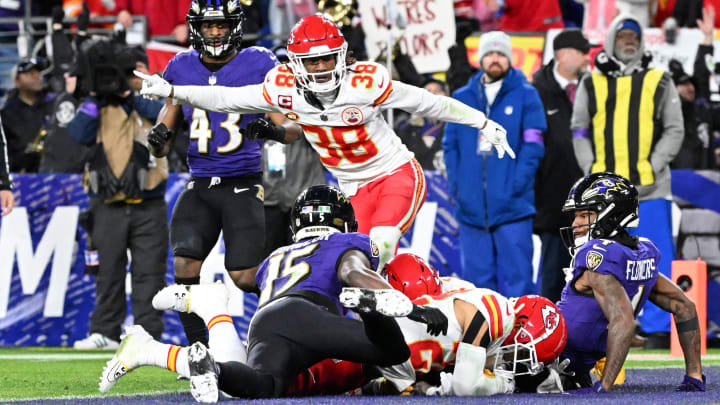 Jan 28, 2024; Baltimore, Maryland, USA; Kansas City Chiefs cornerback L'Jarius Sneed (38) celebrates as cornerback Trent McDuffie (22) recovers a fumble against Baltimore Ravens wide receiver Zay Flowers (4) and wide receiver Nelson Agholor (15) for a turnover during the second half in the AFC Championship football game at M&T Bank Stadium. Mandatory Credit: Tommy Gilligan-USA TODAY Sports