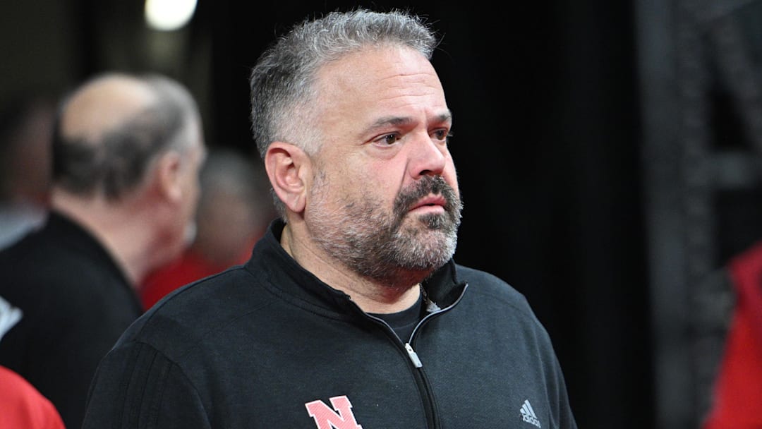 Mar 1, 2025; Lincoln, Nebraska, USA;  Nebraska Cornhuskers football coach Matt Rhule watches the game between the Nebraska Cornhuskers and the Minnesota Golden Gophers during the first half at Pinnacle Bank Arena. Mandatory Credit: Steven Branscombe-Imagn Images