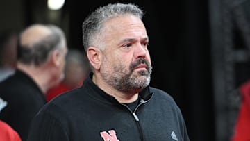 Mar 1, 2025; Lincoln, Nebraska, USA;  Nebraska Cornhuskers football coach Matt Rhule watches the game between the Nebraska Cornhuskers and the Minnesota Golden Gophers during the first half at Pinnacle Bank Arena. Mandatory Credit: Steven Branscombe-Imagn Images
