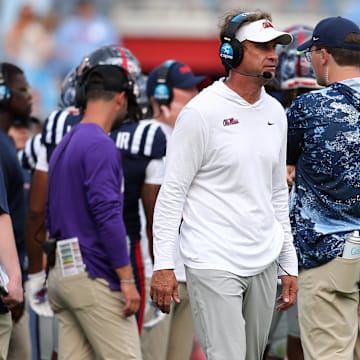 Oct 26, 2024; Oxford, Mississippi, USA; Mississippi Rebels head coach Lane Kiffin watches during a time out during the second half against the Oklahoma Sooners at Vaught-Hemingway Stadium. Mandatory Credit: Petre Thomas-Imagn Images