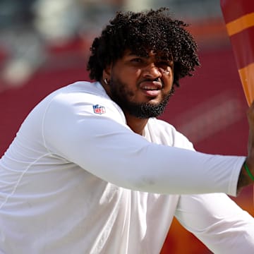 Tampa Bay Buccaneers offensive tackle Tristan Wirfs warms up before a game against the Atlanta Falcons.