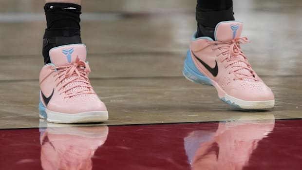 Josh Giddey's pink Nike Kobe sneakers.