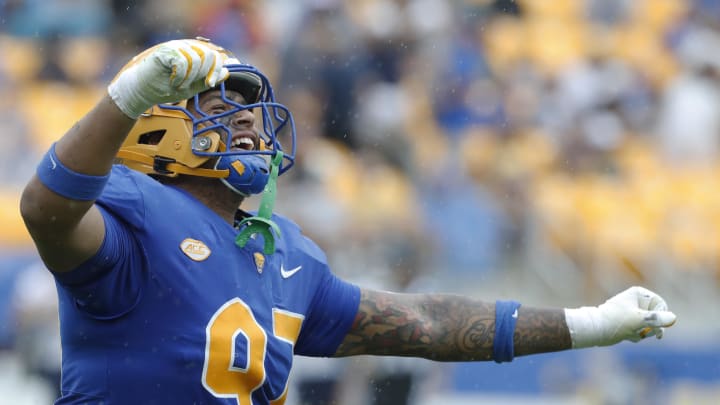 Aug 31, 2024; Pittsburgh, Pennsylvania, USA;  Pittsburgh Panthers defensive lineman Isaiah Neal (97) celebrates a defensive stop against the Kent State Golden Flashes during the second quarter at Acrisure Stadium. Mandatory Credit: Charles LeClaire-USA TODAY Sports