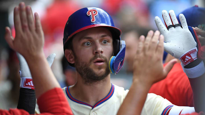 Aug 18, 2024; Philadelphia, Pennsylvania, USA; Philadelphia Phillies shortstop Trea Turner (7) celebrates his home run during the third inning in the dugout against the Washington Nationals at Citizens Bank Park.