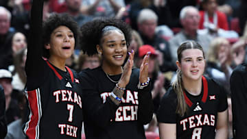 Texas Tech's Bird Martin, from left, Jordyn Merritt and Adlee Blacklock react after a 3-pointer against Oklahoma State in a Big 12 women's basketball game Saturday, Jan. 25, 2025, at United Supermarkets Arena.