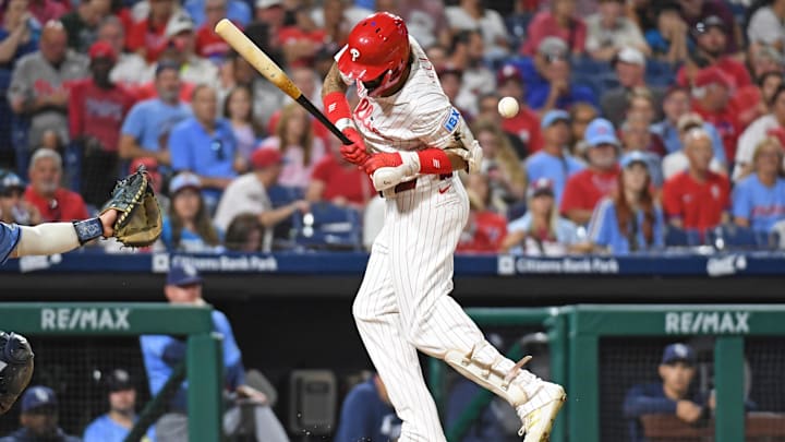 Sep 10, 2024; Philadelphia, Pennsylvania, USA; Philadelphia Phillies outfielder Nick Castellanos (8) gets hit by a pitch during the eighth inning against the Tampa Bay Rays at Citizens Bank Park. Mandatory Credit: Eric Hartline-Imagn Images