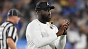 Oct 12, 2024; Pasadena, California, USA; UCLA Bruins head coach DeShaun Foster during the second quarter against the Minnesota Golden Gophers at the Rose Bowl. Mandatory Credit: Robert Hanashiro-Imagn Images