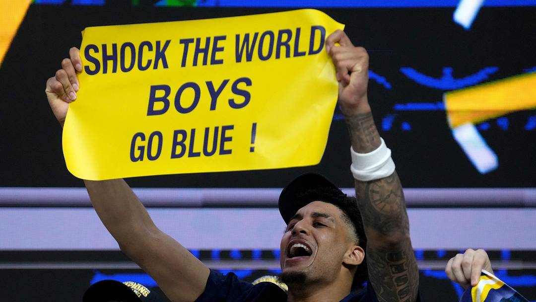 Michigan Wolverines forward Yaxel Lendeborg (23) celebrates the teamâ€™s NCAA men's basketball tournament national championship victory Monday, April 6, 2026, after defeating the UConn Huskies 69-63 at Lucas Oil Stadium in Indianapolis.