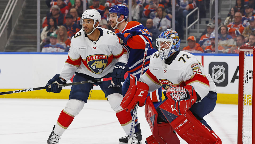 Mar 19, 2026; Edmonton, Alberta, CAN; Edmonton Oilers forward Zach Hyman (18) battles with Florida Panthers defensemen Seth Jones (3) in front of goaltender Sergei Bobrovsky (72) during the third period at Rogers Place. Mandatory Credit: Perry Nelson-Imagn Images