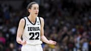 Apr 2, 2023; Dallas, TX, USA; Iowa Hawkeyes guard Caitlin Clark (22) reacts after being called for a technical foul during the game against the LSU Lady Tigers in the second half during the final round of the Women's Final Four NCAA tournament at the American Airlines Center. Mandatory Credit: Kevin Jairaj-Imagn Images