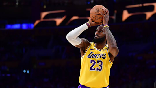 Dec 31, 2024; Los Angeles, California, USA;  Los Angeles Lakers forward LeBron James (23) shoots a three point basket against the against the Cleveland Cavaliers during the first half at Crypto.com Arena. Mandatory Credit: Gary A. Vasquez-Imagn Images