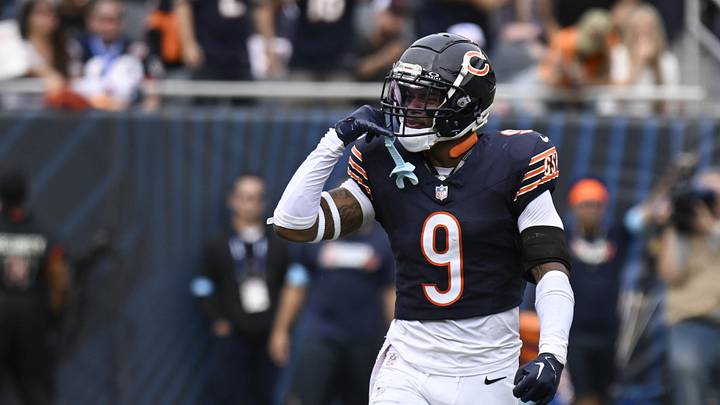 Sep 29, 2024; Chicago, Illinois, USA;  Chicago Bears safety Jaquan Brisker (9) after sacking Los Angeles Rams linebacker Jared Verse (8) during the second half at Soldier Field. Mandatory Credit: Matt Marton-Imagn Images