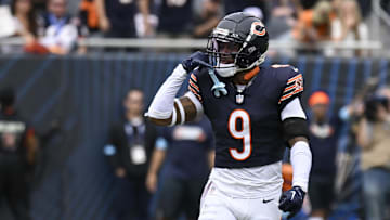 Sep 29, 2024; Chicago, Illinois, USA;  Chicago Bears safety Jaquan Brisker (9) after sacking Los Angeles Rams linebacker Jared Verse (8) during the second half at Soldier Field. Mandatory Credit: Matt Marton-Imagn Images