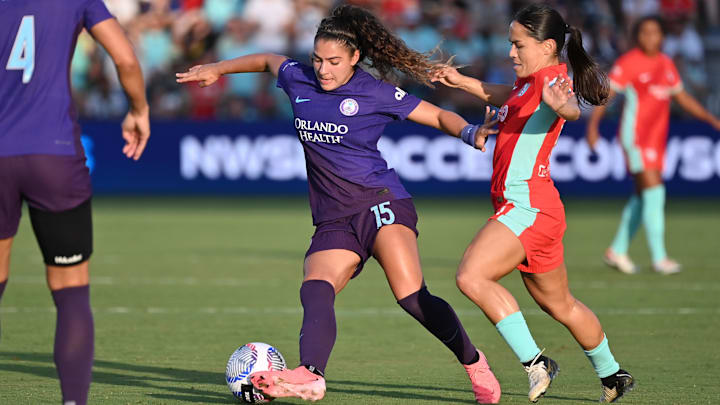 Orlando Pride midfielder Angelina (15) controls the ball against Kansas City Current midfielder Lo'eau LaBonta (10) during the second half at CPKC Stadium