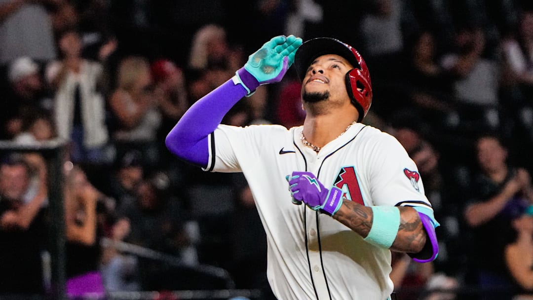 Sep 2, 2025; Phoenix, Arizona, USA; Arizona Diamondbacks second base Ketel Marte (4) celebrates his three run home run in the seventh inning of the game between Arizona Diamondbacks and Texas Rangers at Chase Field. Mandatory Credit: Arianna Grainey-Imagn Images