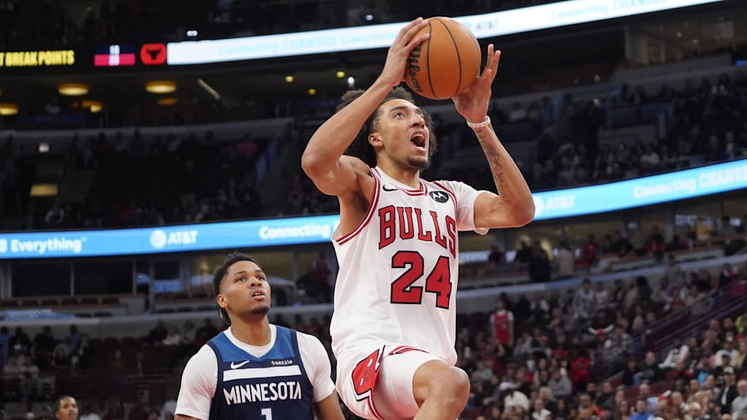 Oct 16, 2025; Chicago, Illinois, USA; Minnesota Timberwolves guard/forward Terrence Shannon Jr. (1) defends Chicago Bulls forward Noa Essengue (24) during the second half at United Center.