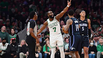 Apr 20, 2025; Boston, Massachusetts, USA; Boston Celtics guard Jaylen Brown (7) questions a foul to referee Mitchell Ervin during the second half against the Orlando Magic at TD Garden. Mandatory Credit: Bob DeChiara-Imagn Images