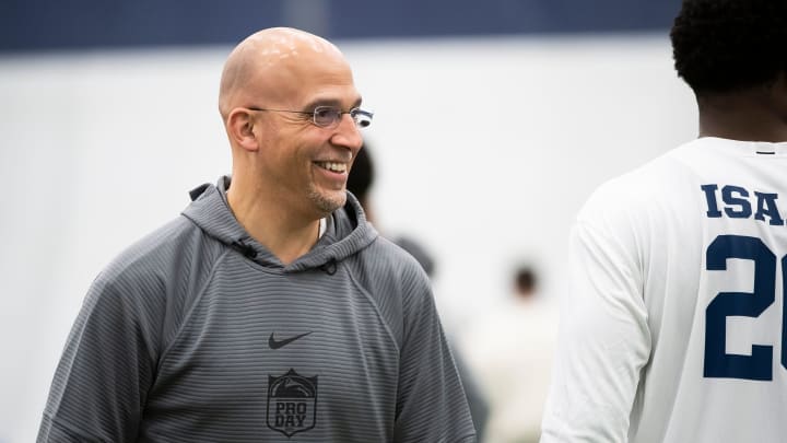 Penn State coach James Franklin talks with a few players at the program's Pro Day in Holuba Hall. 