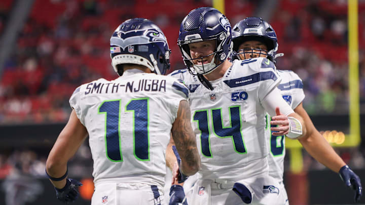 The Seahawks Super Bowl odds improved thanks to wide receiver Jaxon Smith-Njigba (left) and quarterback Sam Darnold (center). 