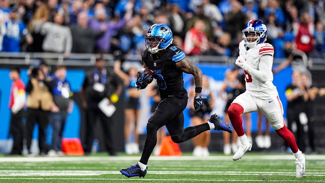 Detroit Lions running back Jahmyr Gibbs (0) runs against New York Giants during overtime at Ford Field in Detroit on Sunday, Nov. 23, 2025.