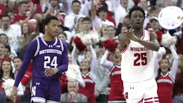 Wisconsin guard John Blackwell (25) celebrates his three-point basket during the first half of their game against the Northwestern Wednesday, December 3, 2025 at the Kohl Center in Madison, Wisconsin.