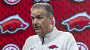 Arkansas Razorbacks coach John Calipari talks with the media during SEC Media Day at Grand Bohemian Hotel.