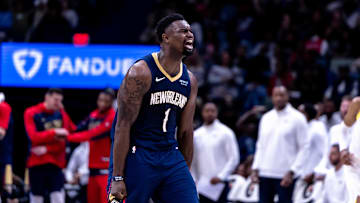 Jan 17, 2025; New Orleans, Louisiana, USA; New Orleans Pelicans forward Zion Williamson (1) reacts to dunking the ball through the arm of Utah Jazz forward Drew Eubanks (15) during the second half at Smoothie King Center. Mandatory Credit: Stephen Lew-Imagn Images
