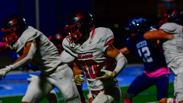 Becker football senior Caleb Maddox runs the ball during a home game versus ROCORI on Oct. 10, 2025. The Bulldogs lost 28-21.