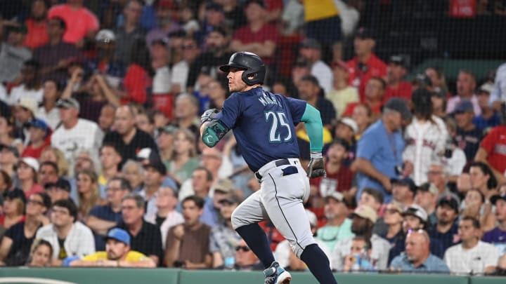 Seattle Mariners third baseman Dylan Moore (25) hits an RBI double against the Boston Red Sox during the fifth inning at Fenway Park on July 30.